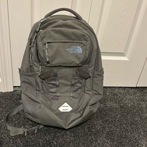 North face book bag! Has a little rip in the one section.